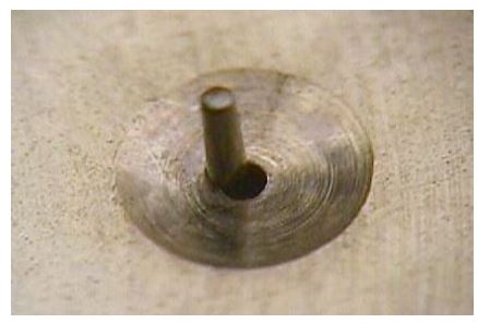 Worn pivot hole.