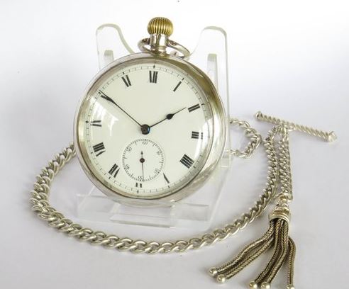 Omega pocket watch and chain.