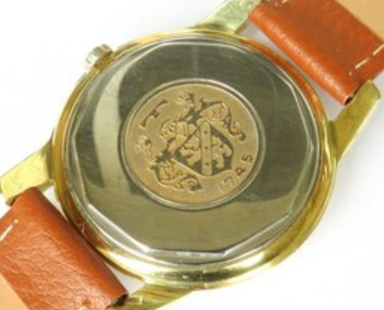 Technos 1745 shield emblem.